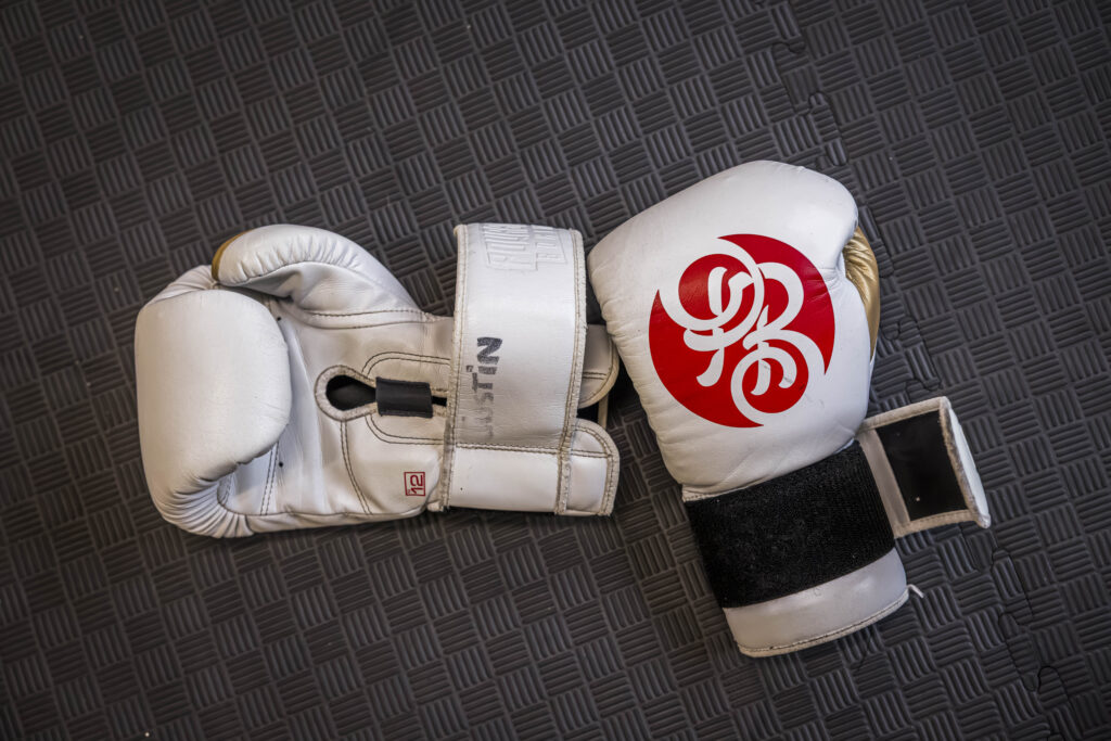 Justin's gloves laying on the floor