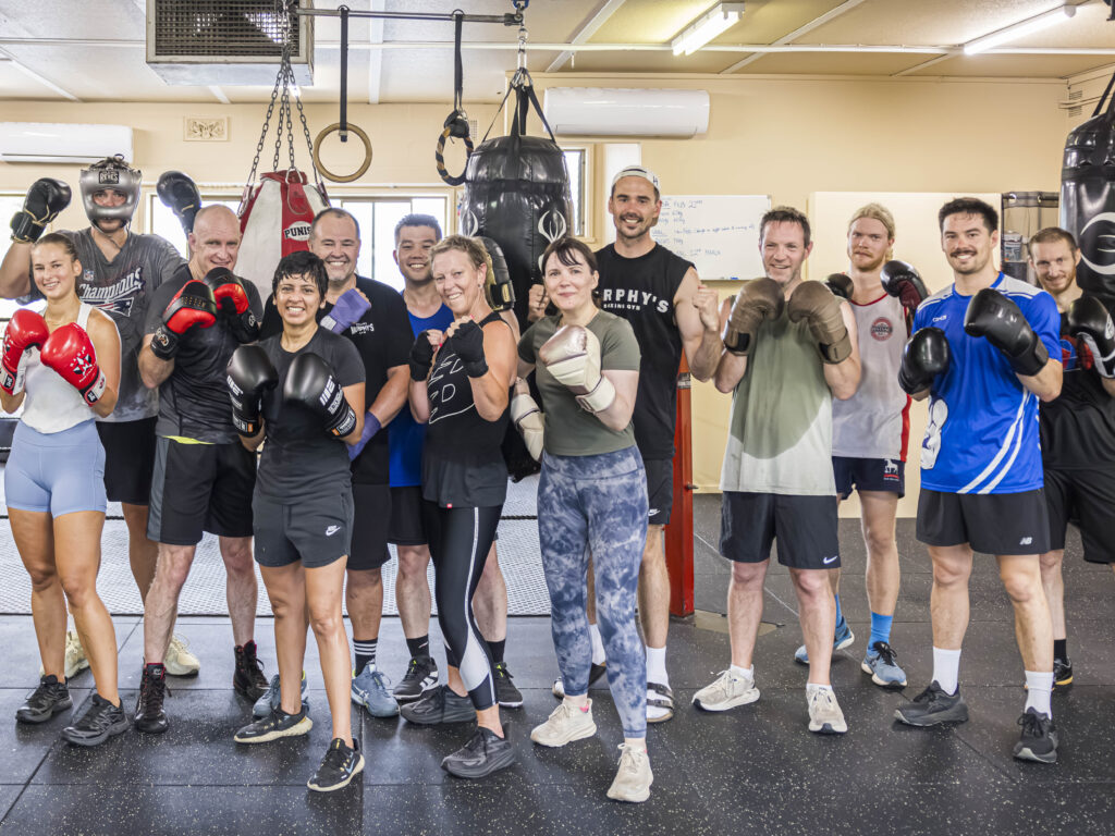 Group shot of the team after class