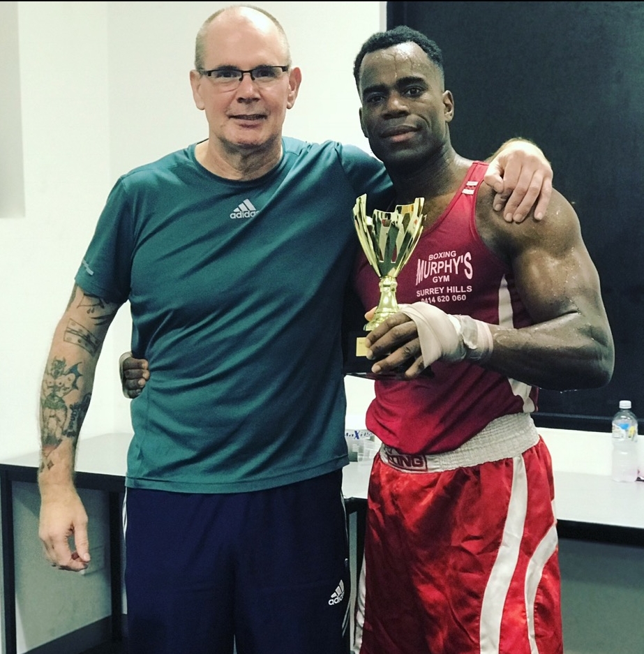 Another champion - a boxer and their trophy